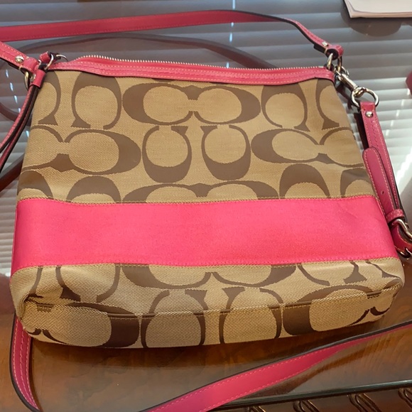 Coach Handbags - Coach Signature Pink Trimmed handbag-Never Used